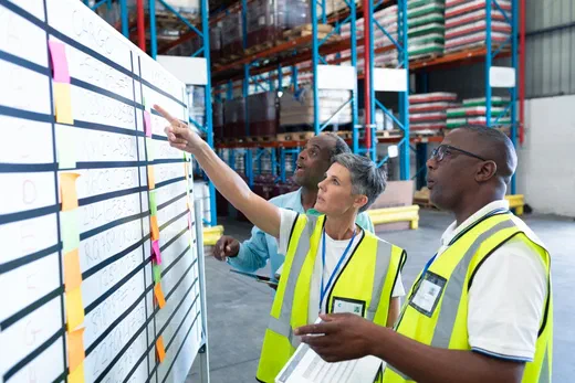 Operations team collaborating in a metals manufacturing facility